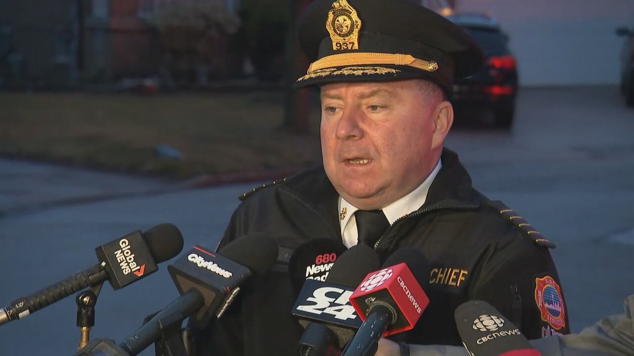 default-191 Man in fire uniform speaks into microphones